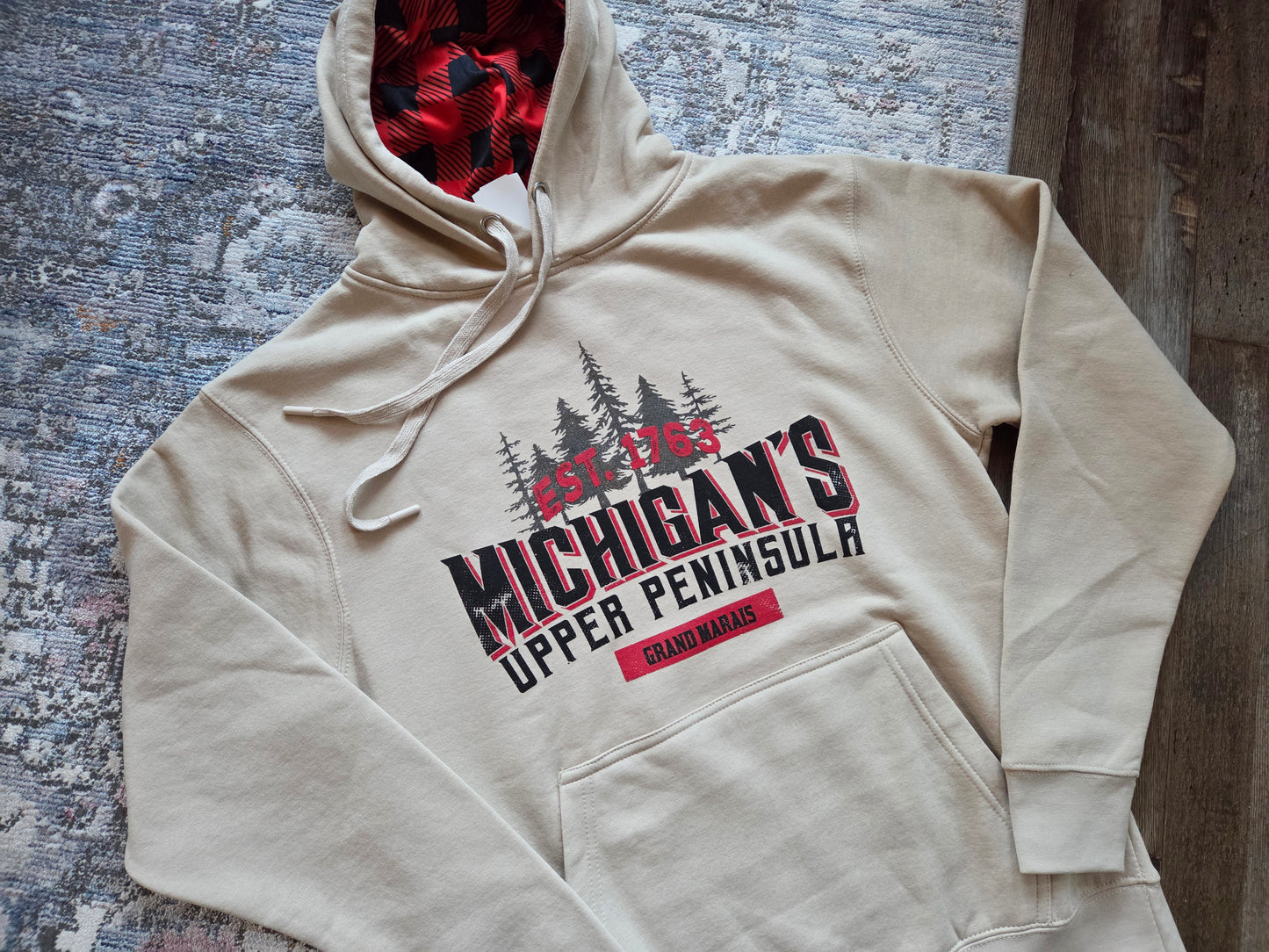 Oatmeal colored hoodie with plaid inside hood