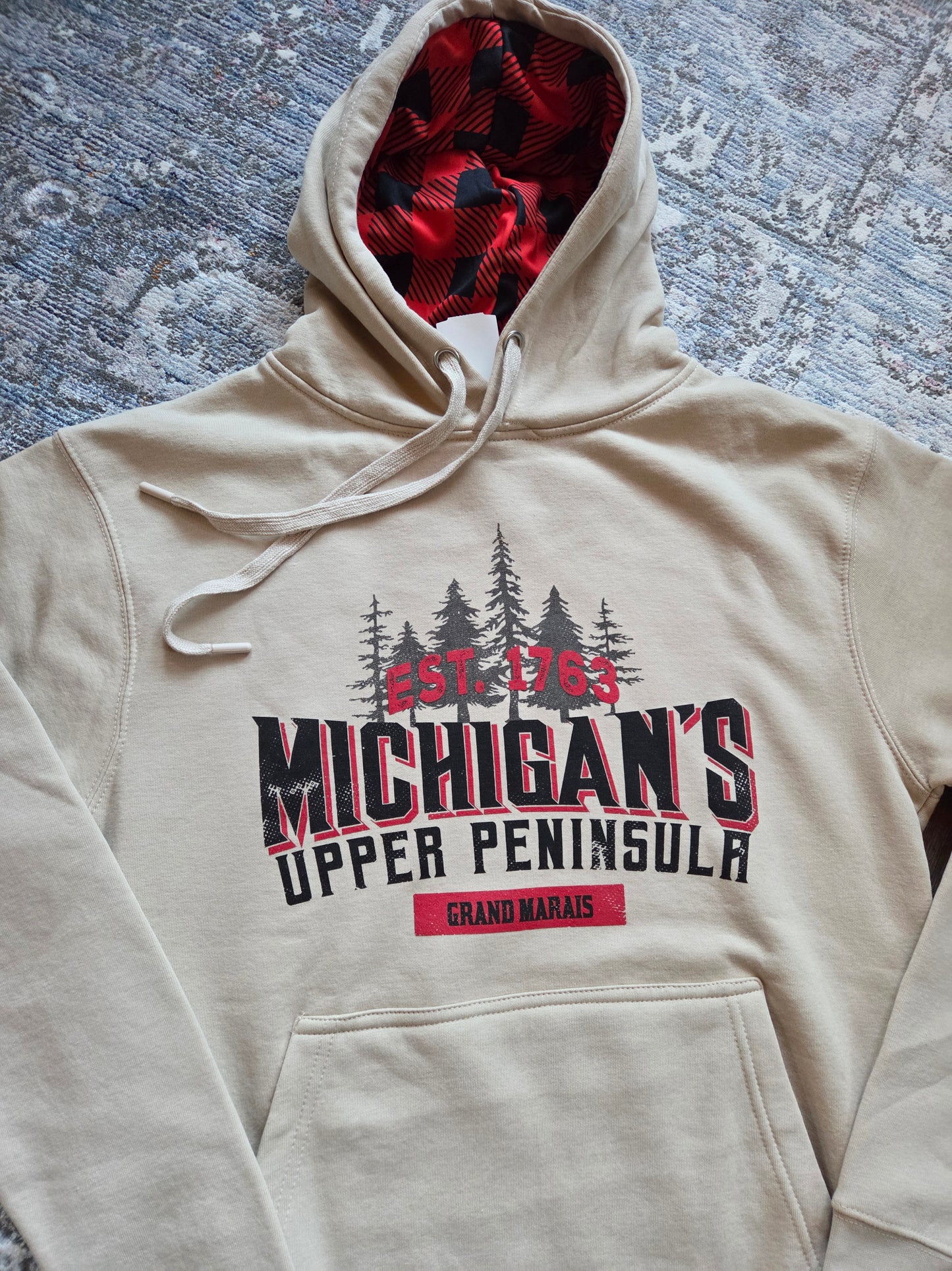 Oatmeal colored hoodie with plaid inside hood