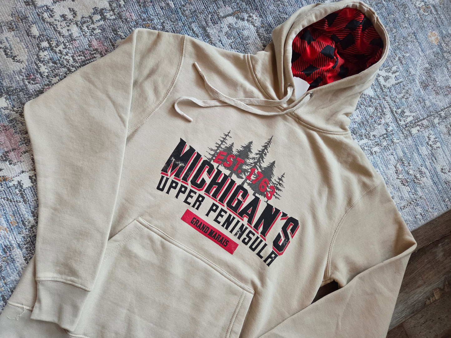 Oatmeal colored hoodie with plaid inside hood