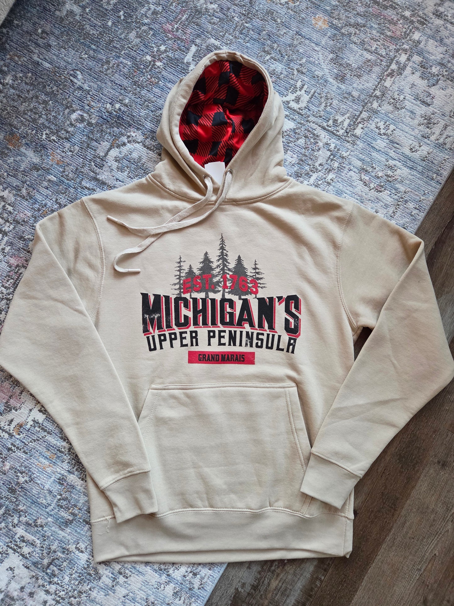 Oatmeal colored hoodie with plaid inside hood