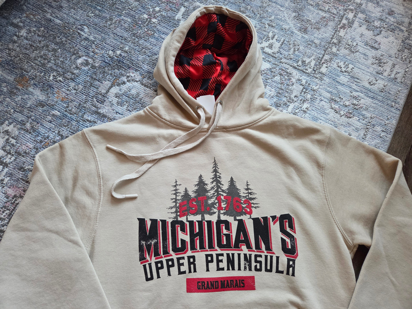 Oatmeal colored hoodie with plaid inside hood