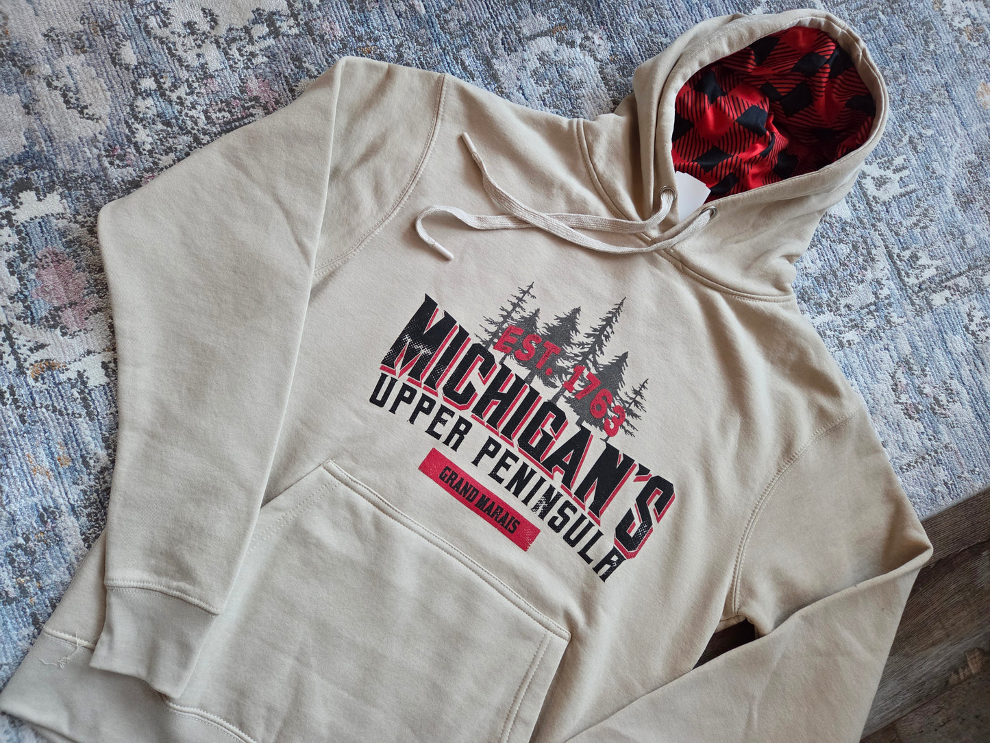 Oatmeal colored hoodie with plaid inside hood