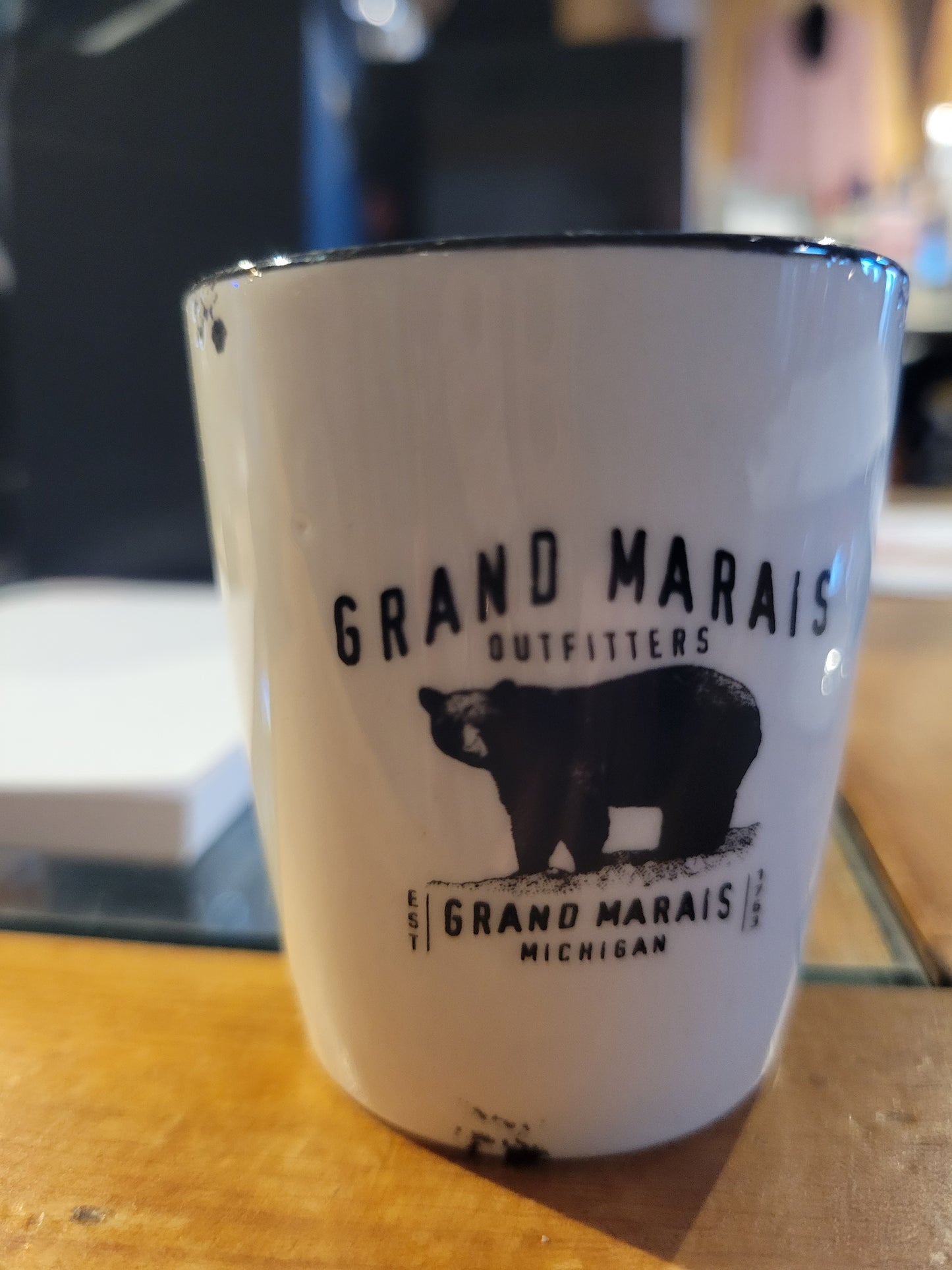 Ceramic shot glass with Grand Marais Bear