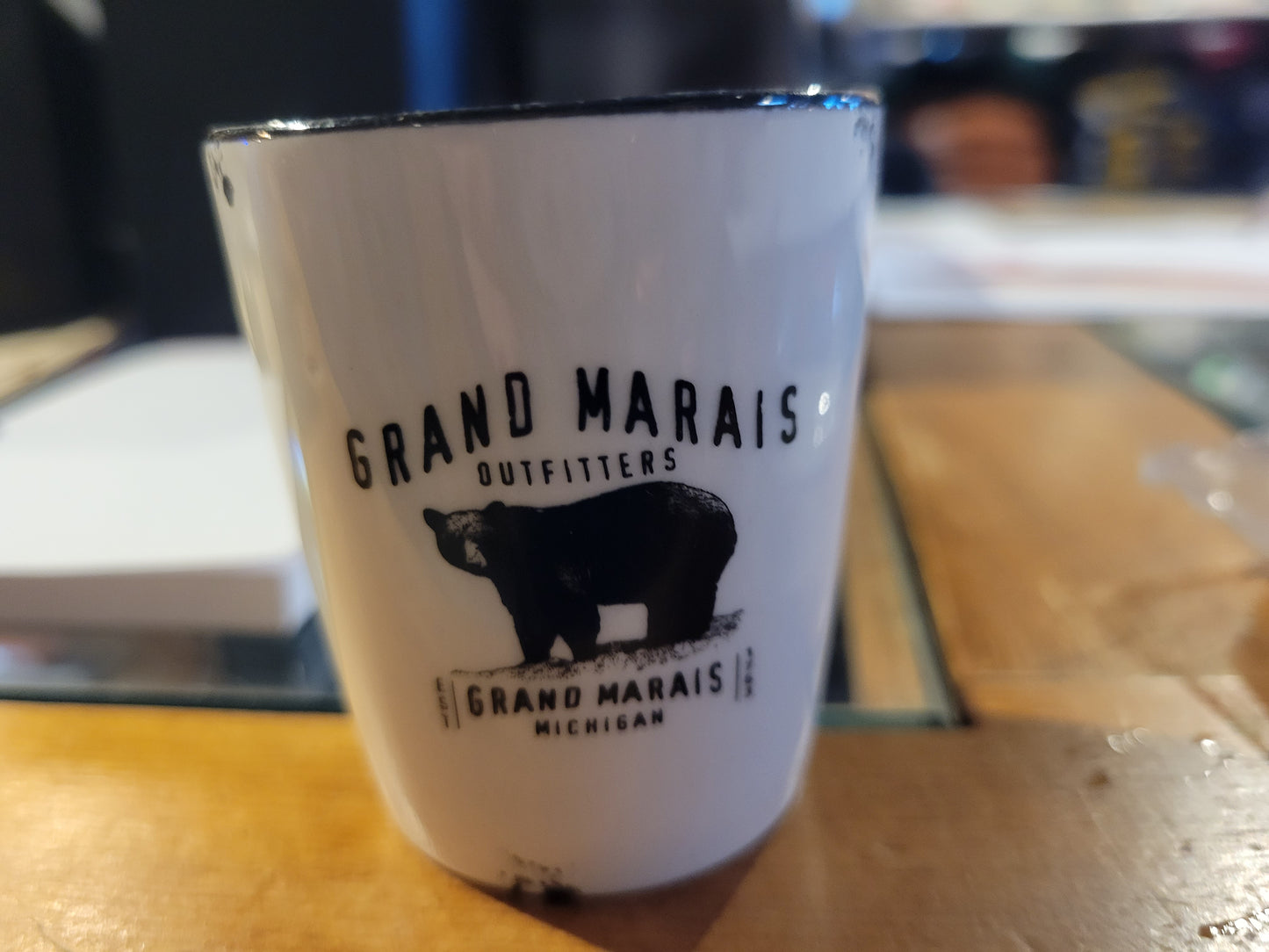 Ceramic shot glass with Grand Marais Bear